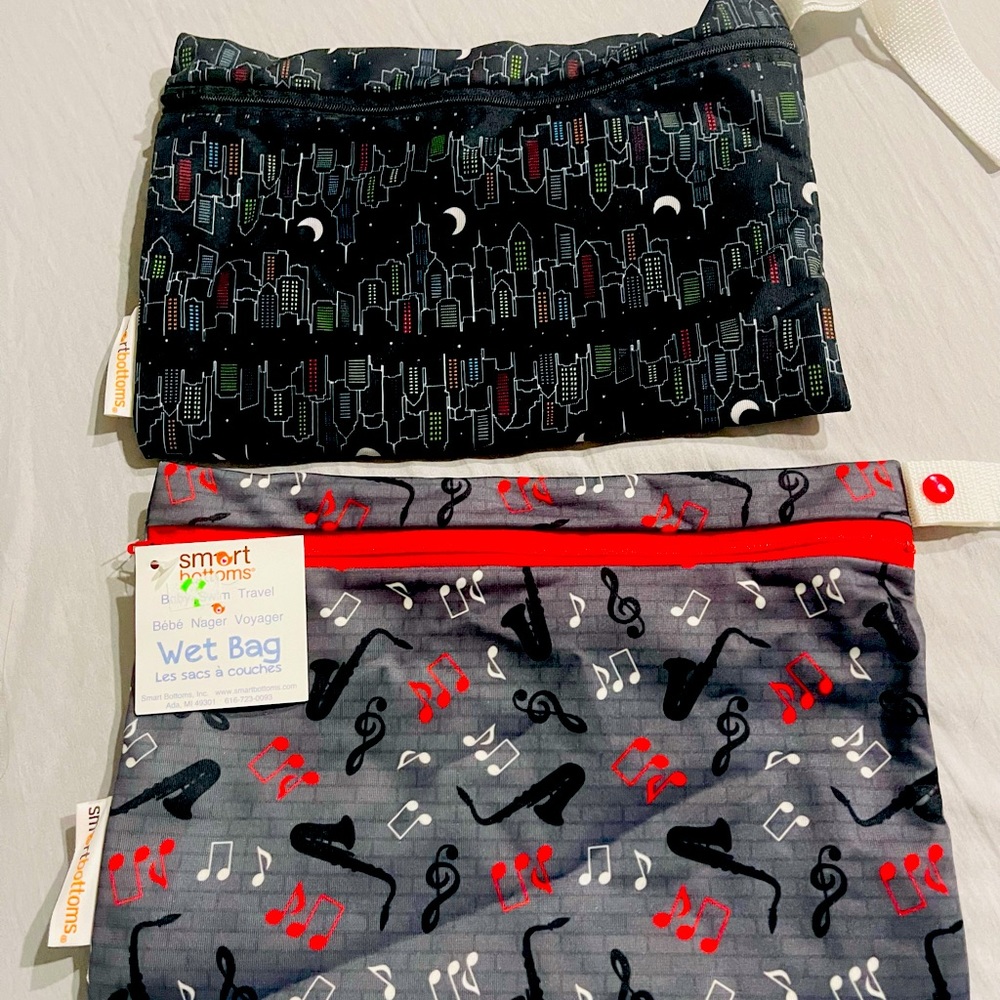 Set of 2 smart bottoms wet bags night out and music notes